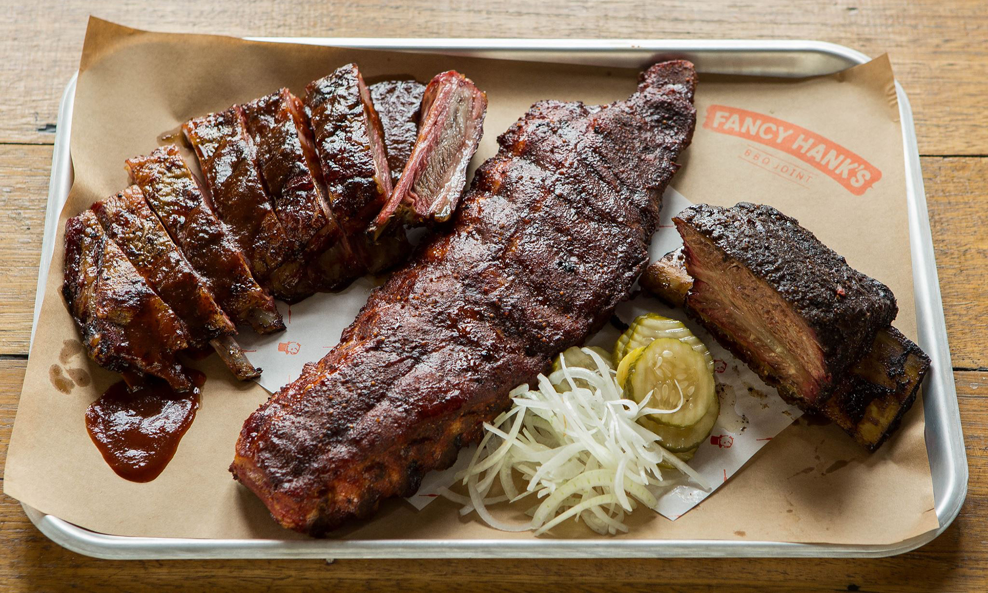 Free range BBQ meats come in the form of Angus beef brisket, beef short rib...